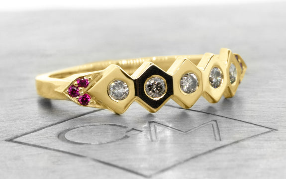 1925 Wedding Band with Gray Diamonds & Rubies in rose gold on logo