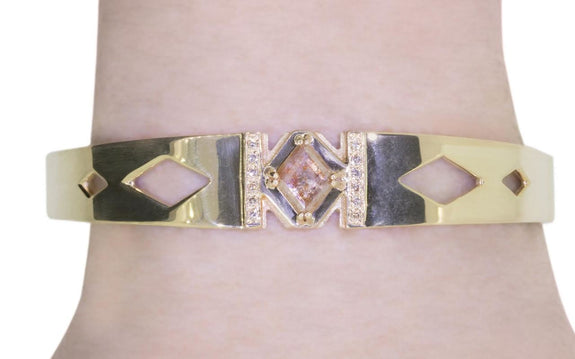 peach diamond bracelet side view on logo