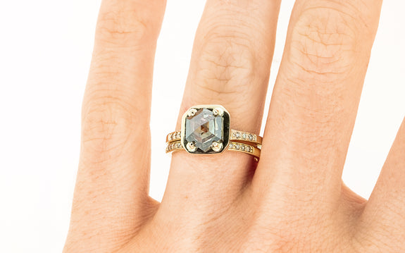 AIRA Ring in Yellow Gold with 1.58 Carat Champagne Diamond on a hand with wedding band