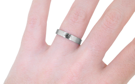 Women's 4mm Flat Band worn with engagement ring