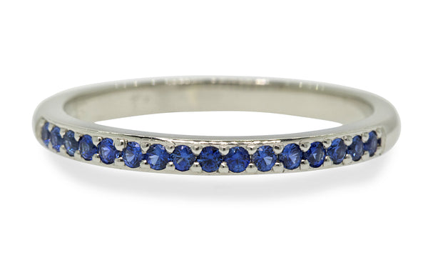 Wedding Band with 16 Blue Sapphires being modeled