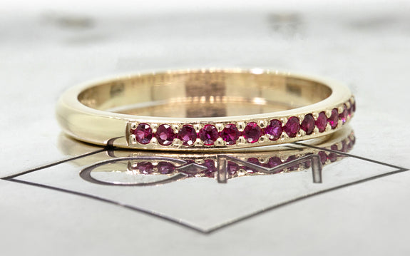 Wedding Band with 16 Rubies front view on logo